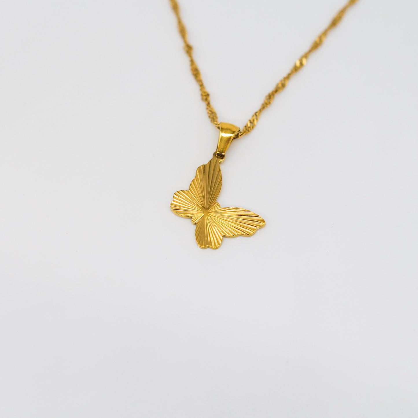 Collier pendentif papillon