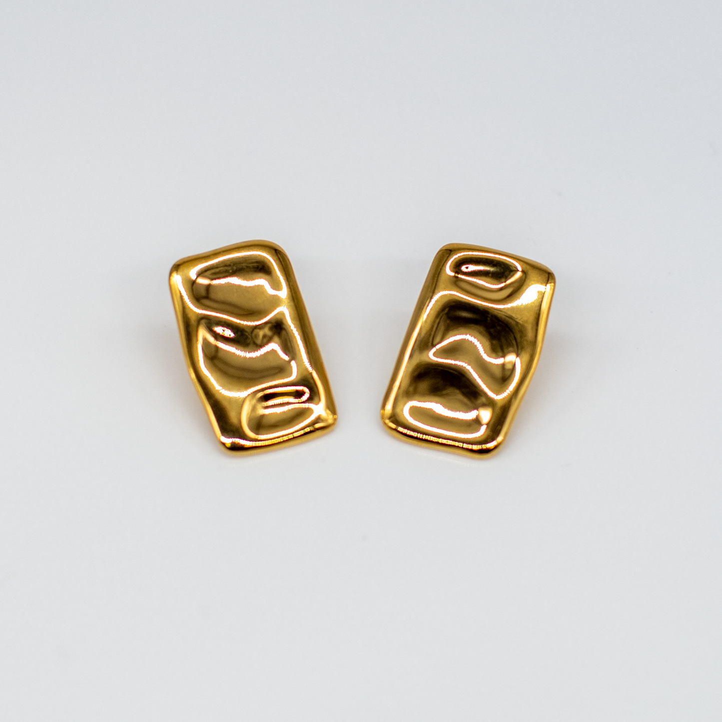 Boucles d’oreilles rectangulaires modernes et tordues