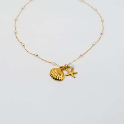 Collier coquillage et étoile de mer avec perles