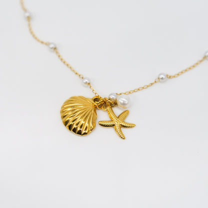 Collier coquillage et étoile de mer avec perles