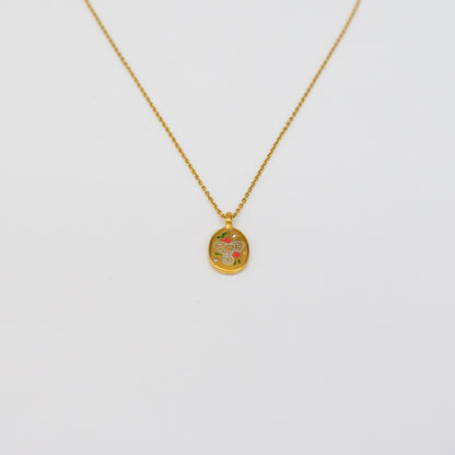 Collier pendentif ovale éléphant et fleurs